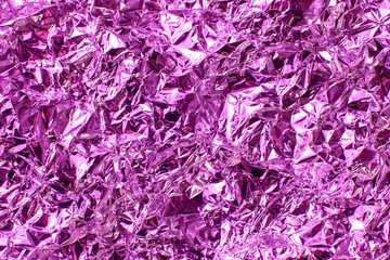 Holographic iridescent metallic foil. Real Hologram Background of wrinkled abstract foil 80s...