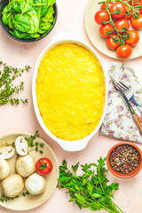 Gratin, julienne or casserole from baked mushroom with chicken and cheese