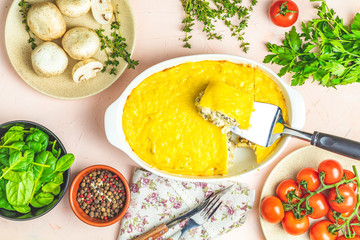 Gratin, julienne or casserole from baked mushroom with chicken and cheese