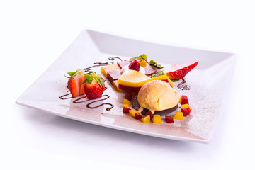 vanilla ice cream with raspberries and strawberries