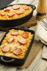 Baked macaroni and cheese. Casserole dish with baked macaroni and cheese 