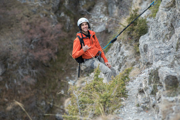 Young man doing a climbing line in Canillo, Andorra.
