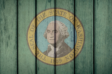 Fototapeta na wymiar USA Politics News Concept: US State Washington Flag Wooden Fence