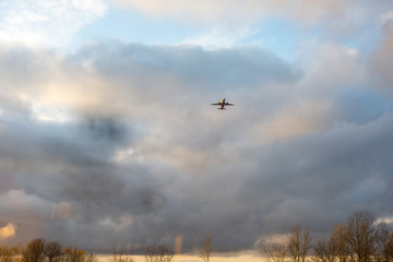 plane in the sky on takeoff