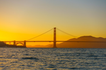 Fototapeta na wymiar Bridge Golden Gate at San Francisco sunset