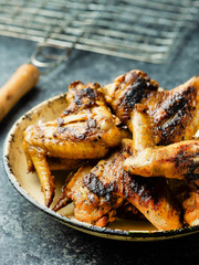 plate of barbecue chicken wing