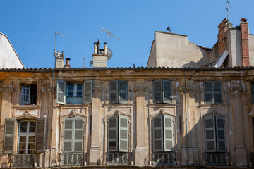 Beautiful weathered apartment buildings in the charming city of Aix-en-Provence