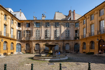 Place D'Albertas fountain and weathered old buildings