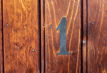 number 9 on door of storage room for tenants in century-old apartment building in stockholm