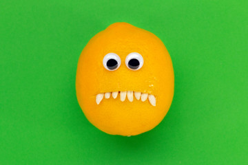 sad lemon face with eyes and teeth