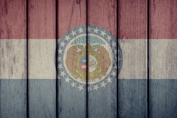 USA Politics News Concept: US State Missouri Flag Wooden Fence