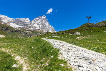 Fototapeta na wymiar Summer landscape with Matterhorn (Cervino) viewed from a trail near Breuil-Cervinia, Aosta Valley, Italy