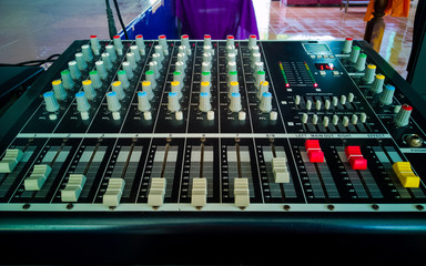 Buttons on the audio control panel and music equalizer for outdoor work