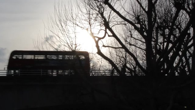 commuters at rush hour and people walking over Waterloo Bridge bus stock footage video