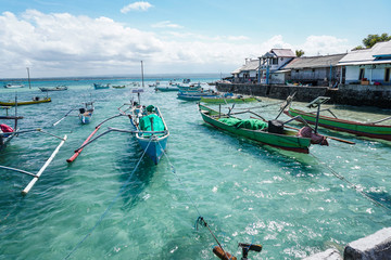 Obraz premium fishing boats anchored on the dock