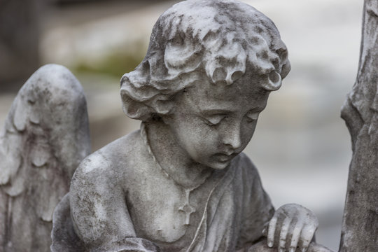 statue of angel in cemetery