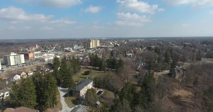 Flying Over Large Residence Straight Up Revealing Small Town Aerial In Early Spring