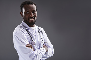 Waist up of a cheerful doctor enjoying his speciality