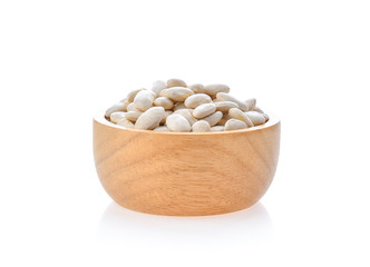 White beans in wood bowl isolated on white background