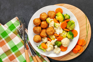 Meatballs with broccoli and a cauliflower