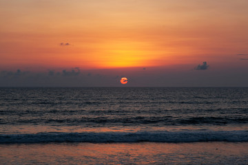 red ocean sunset on bali island