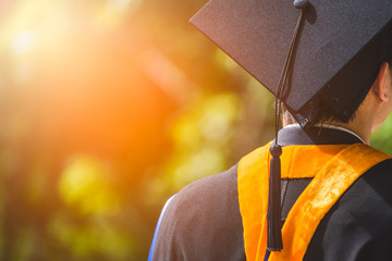 Back view of Graduates during commencement. Concept education congratulation in University.