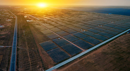 Aerial photography of solar photovoltaic panels at sunrise