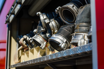 Closeup of the modern fire truck with firefighting equipment