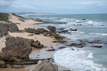 Coastline landscape with waves and rocks in background