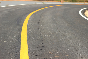 Naklejka premium Curved Road at Countryside