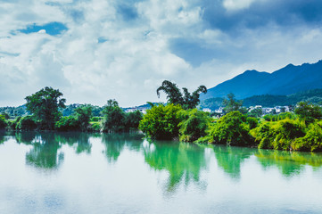 Obraz na płótnie Canvas The river and mountains scenery in spring