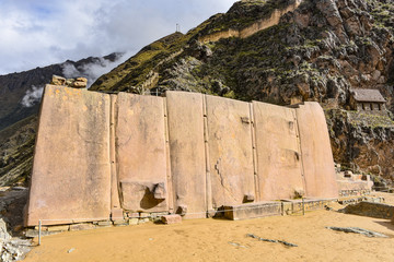 Cusco, Peru - Oct 22, 2018: Wall of the Six Monoliths at the Ollantaytambo archaeological site in the Sacred Valley