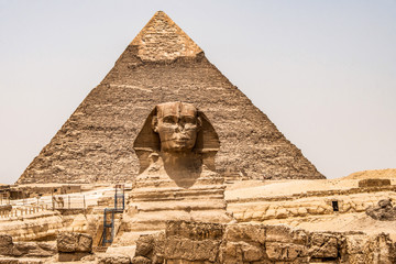 Egyptian Great Sphinx full body portrait head,with pyramids of Giza background Egypt empty with nobody. copy space
