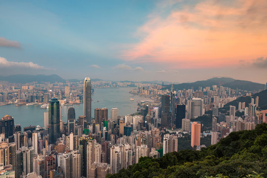 Aerial view Hong Kong city skyline with after sunset sky background, cityscape background