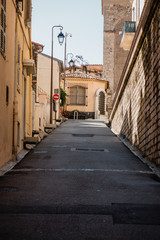 Fototapeta na wymiar Empty alley of european old town, Cannes France
