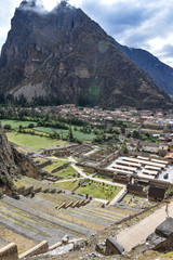 Cusco, Peru - Oct 22, 2018: Stone buildings and terraces at the Ollantaytambo archaeological site in the Sacred Valley