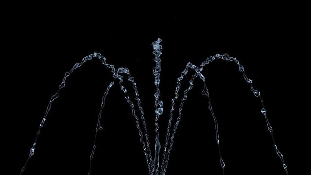 4K slow motion blue water fountain isolated on a black background with alpha matte