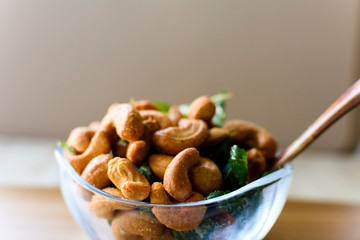 roasted spicy cashew nuts in a bowl