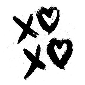 XOXO hand written phrase with hearts isolated on white background with ink spray. Hugs and kisses sign. Grunge brush lettering XO. Easy to edit template for Valentine’s day greeting card, poster, etc.