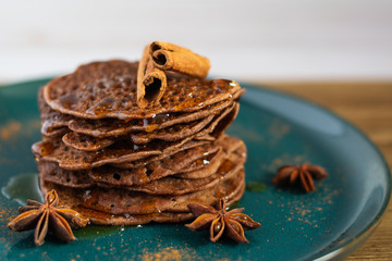 Fototapeta premium Chocolate pancakes with honey