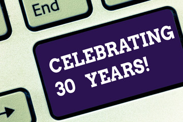 Handwriting text Celebrating 30 Years. Concept meaning Commemorating a special day being 30 years together Keyboard key Intention to create computer message pressing keypad idea