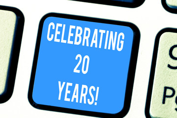 Word writing text Celebrating 20 Years. Business concept for Commemorating a special day being 20 years together Keyboard key Intention to create computer message pressing keypad idea