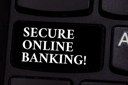 Writing note showing Secure Online Banking. Business photo showcasing Safe way of analysisaging accounts over the internet Keyboard key Intention to create computer message pressing keypad idea