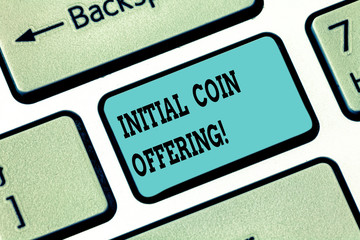 Conceptual hand writing showing Initial Coin Offering. Business photo text Is a type of crowd funding using crypto currencies Keyboard key Intention to create computer message idea