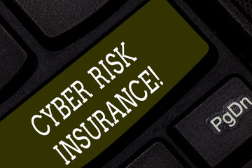 Writing note showing Cyber Risk Insurance. Business photo showcasing covers financial losses that result from data breaches Keyboard key Intention to create computer message pressing keypad idea