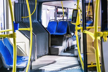 modern City vehicle bus salon with empty passengers seats
