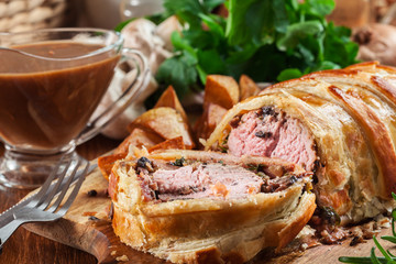 Pork tenderloin in wellington style in puff pastry