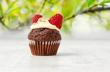 Muffins decorated with fresh fruits