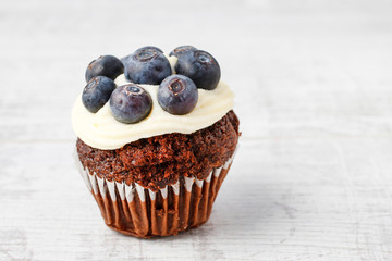 Muffins decorated with fresh fruits