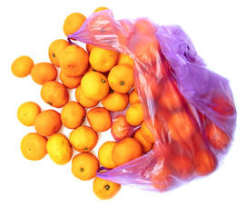 Tangerines in the package on a white background
